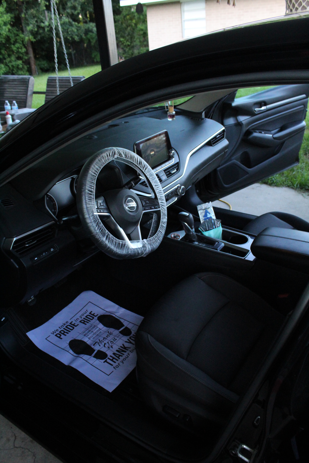 Nissan Altima interior deep clean with protected steering wheel