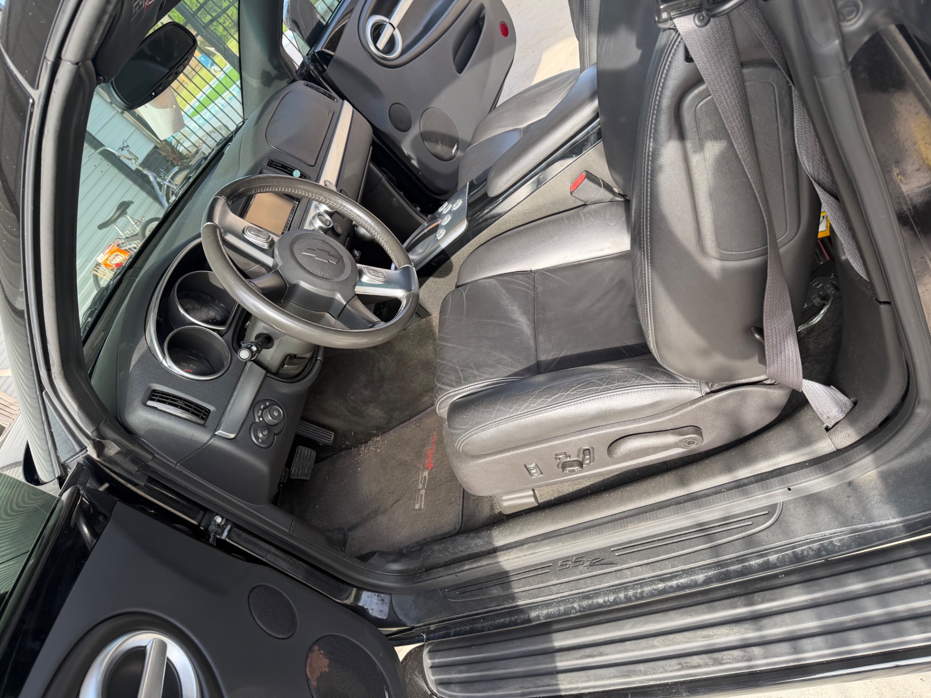 Chevy SSR interior before detail — dusty carpets and seats